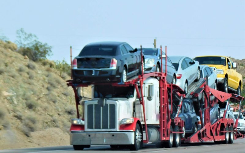 rsz_big-rig-hauling-car-hauler-trailer-with-vehicles-2022-11-08-03-08-38-utc (1)